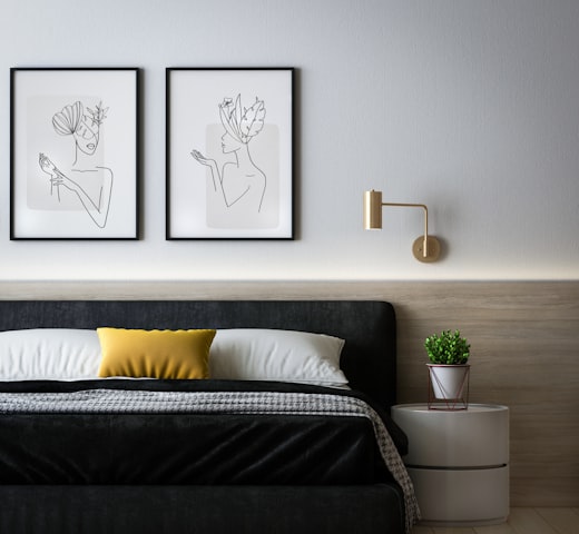 Bedroom with framed art
